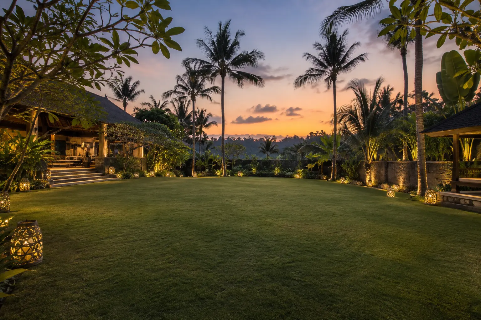 Clear tropical villa garden performance area prepared before an evening event