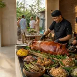 Private chef serving a candlelit jungle dinner at a Sayan valley villa