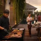 Private chef serving a highland caldera dinner at a Kintamani villa above Lake Batur