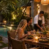 Private chef preparing a casual villa dinner for a group stay in Kuta, Bali