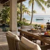Private chef serving a private dinner on a Tanjung Benoa beachfront villa terrace