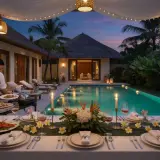 Private chef serving a formal plated course at a Nusa Dua luxury estate with pool and ocean view