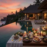 Private chef setting a candlelit table at a Pecatu clifftop villa, Bukit Peninsula