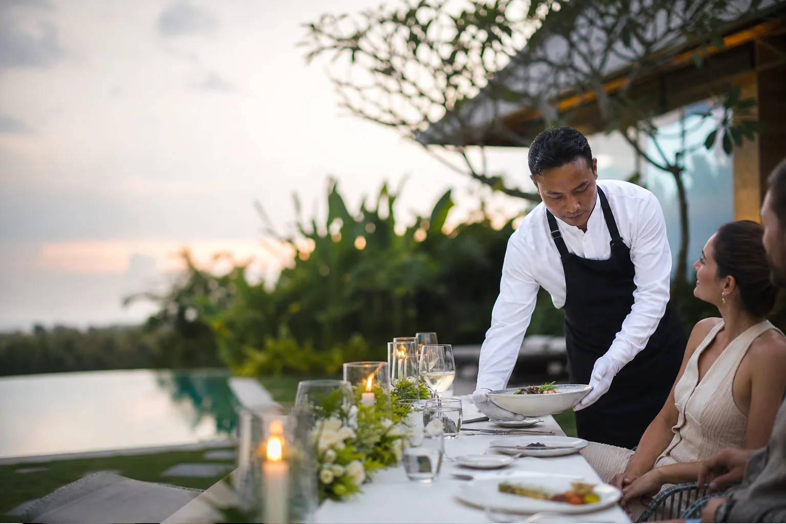 Uniformed myCHEF waiters providing polished in-villa service at a Bali villa